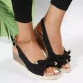 Open toe wedge sandals by Shopimist featuring a stylish design with a comfortable heel and breathable straps.
