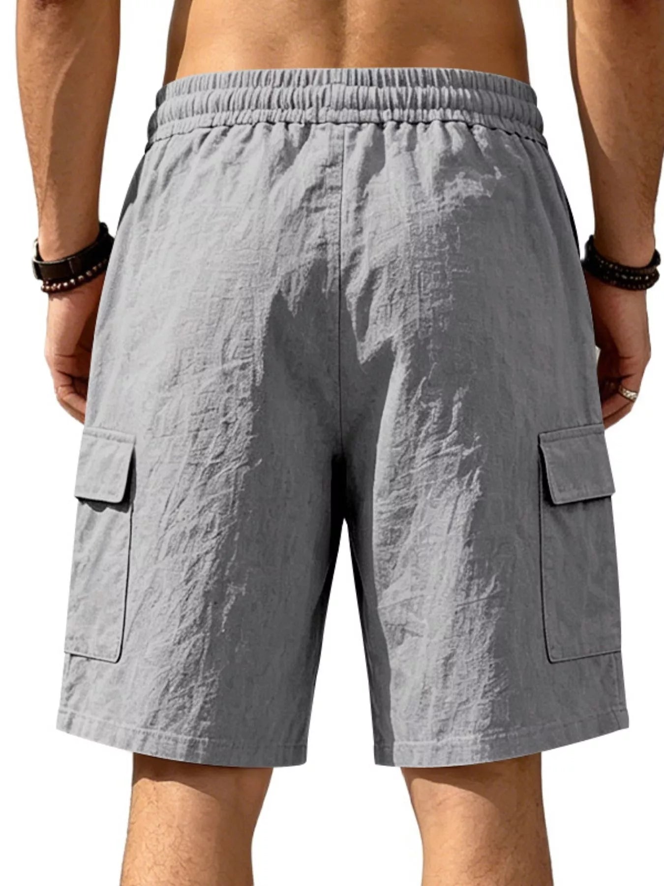 Men's plus size casual cargo shorts with drawstring waist, Trendsi brand, featuring multiple pockets and relaxed fit.