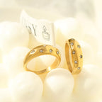 18K gold-plated zircon ring with sparkling clear stones, showcasing elegant jewelry design and fine craftsmanship.