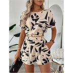 Printed casual two-piece set by Plush Fashion Hub featuring a short sleeve top and matching shorts on a model.