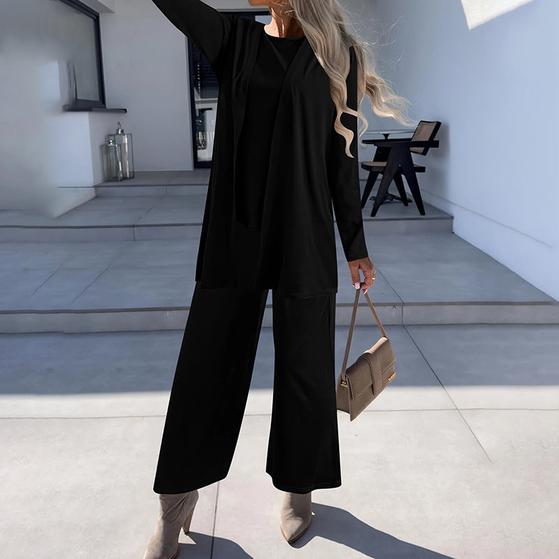 Women's plus size casualwear lounge set with cardigan, vest, and wide-leg pants from FitiqueFit, shown on a model.
