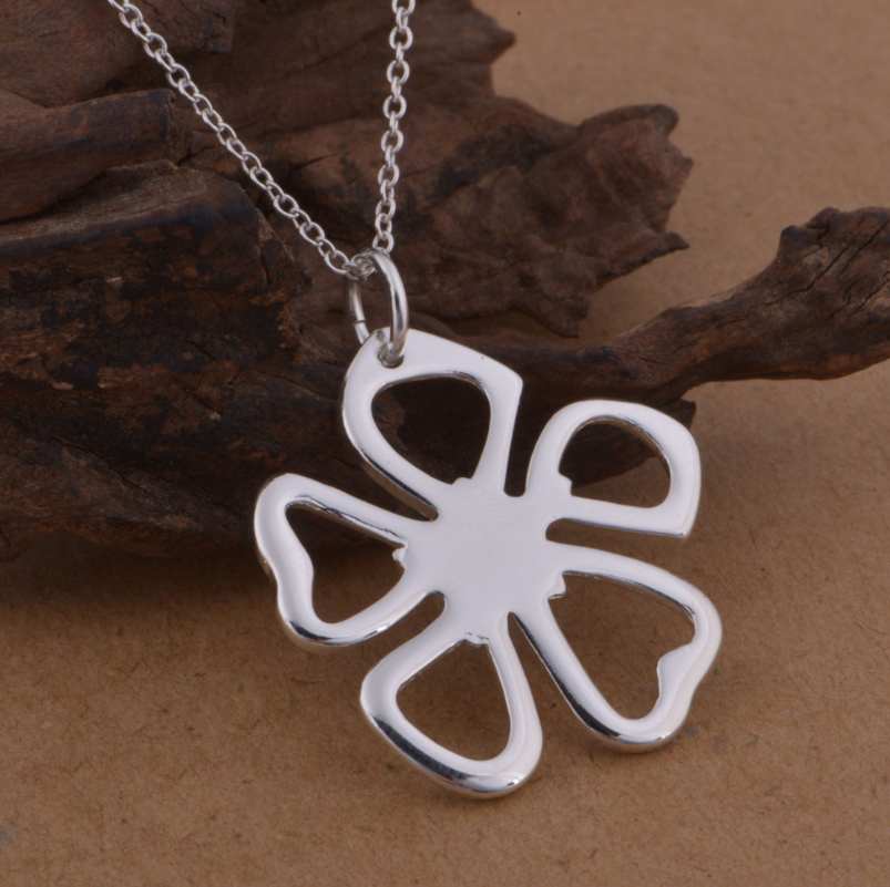 Sterling silver jewelry set with moon and insect motifs, includes necklace and earrings, stylish and suitable for women.