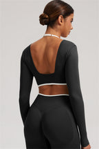Fitglutes Activewear long sleeve crop top and leggings 2-piece set, stylish gymwear for workout and sports activities.