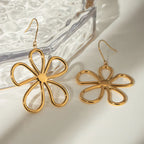 18K gold-plated flower earrings with intricate petal design, showcasing elegant floral jewelry from Shopimist.