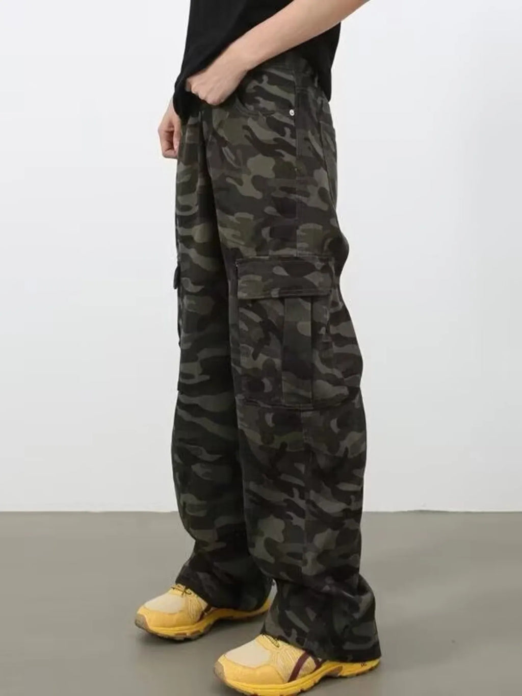 Men's camo print wide leg cargo jeans in plus size from Trendsi, showing the camouflage pattern and relaxed fit design.