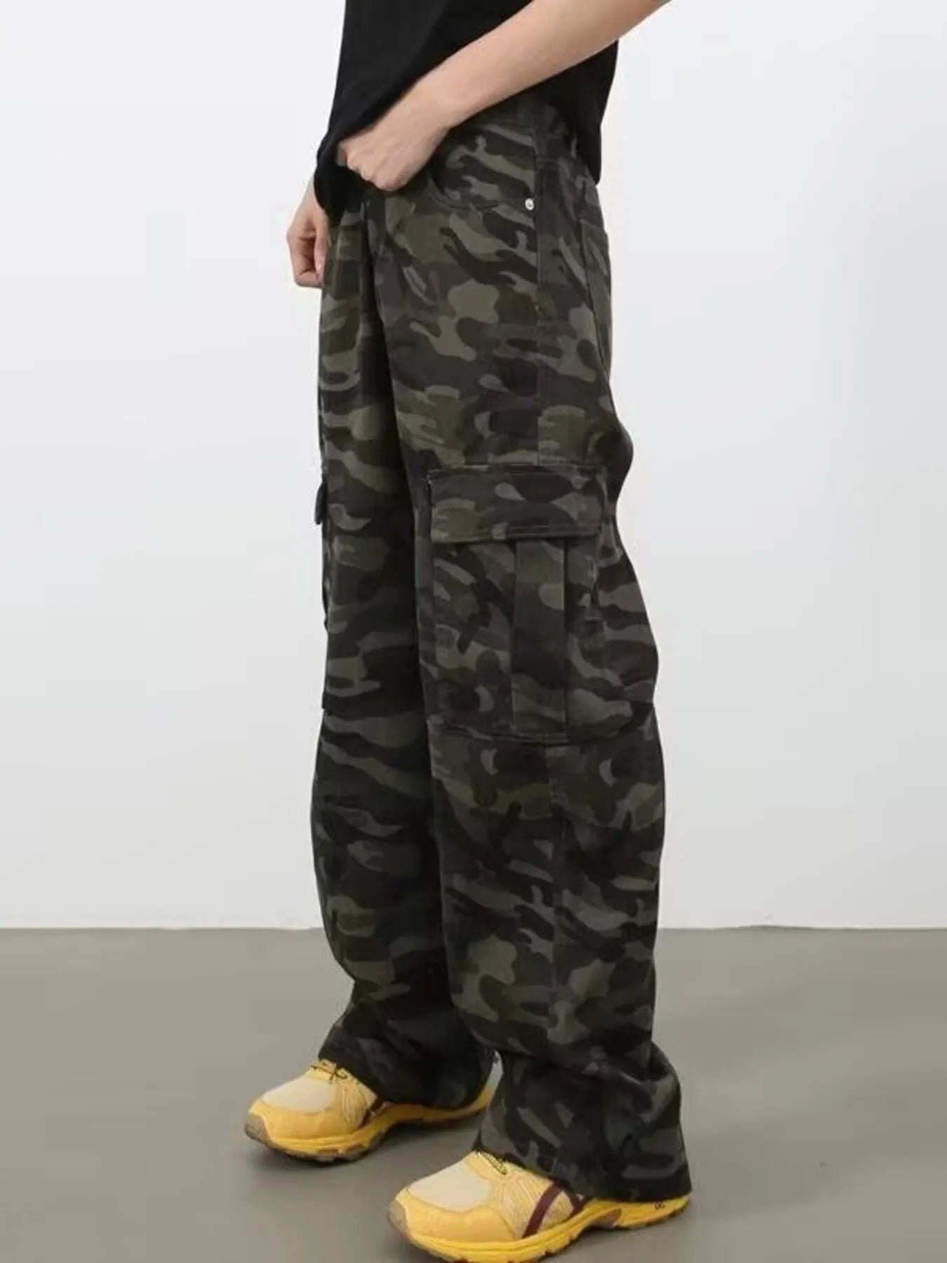 Men's camo print wide leg cargo jeans in plus size from Trendsi, showing the camouflage pattern and relaxed fit design.