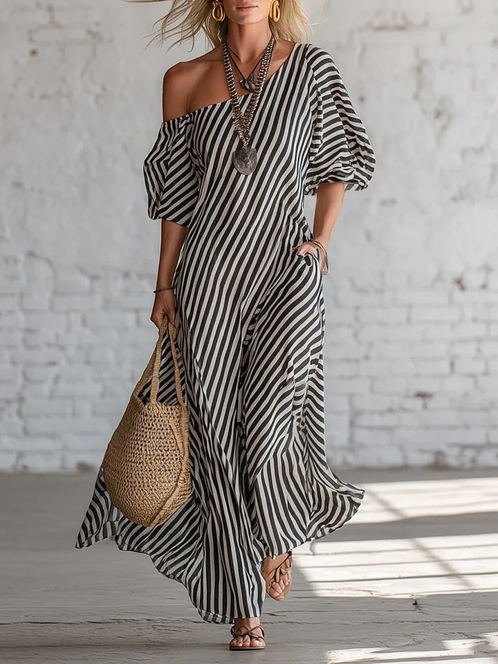 Women's striped off-shoulder dress by Plush Fashion Hub, featuring a stylish design with horizontal stripes and a relaxed fit.
