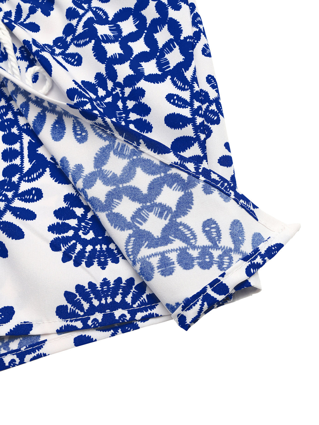 Printed tie-front skort for women, high-waist casual bottoms by Plush Fashion Hub, styled as trendy pants with a front tie detail.