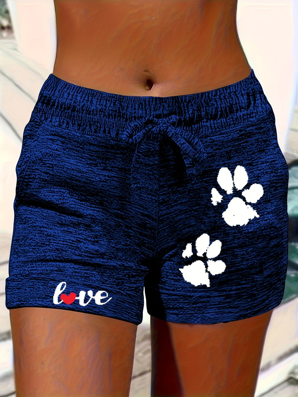 Women's printed elastic waist cropped shorts with pockets, casualwear by Plush Fashion Hub, featuring vibrant patterns and comfortable fit.