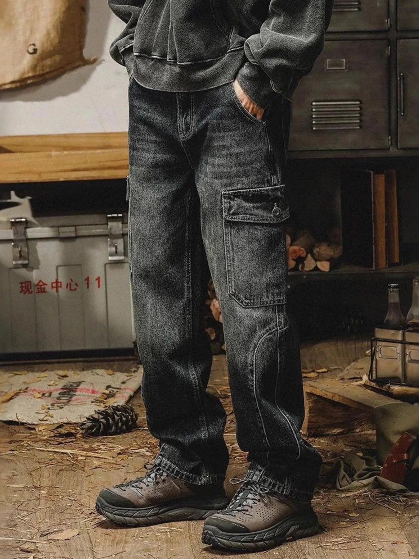 Men's washed wide leg cargo jeans by Trendsi, featuring relaxed fit, multiple pockets, and durable denim fabric.