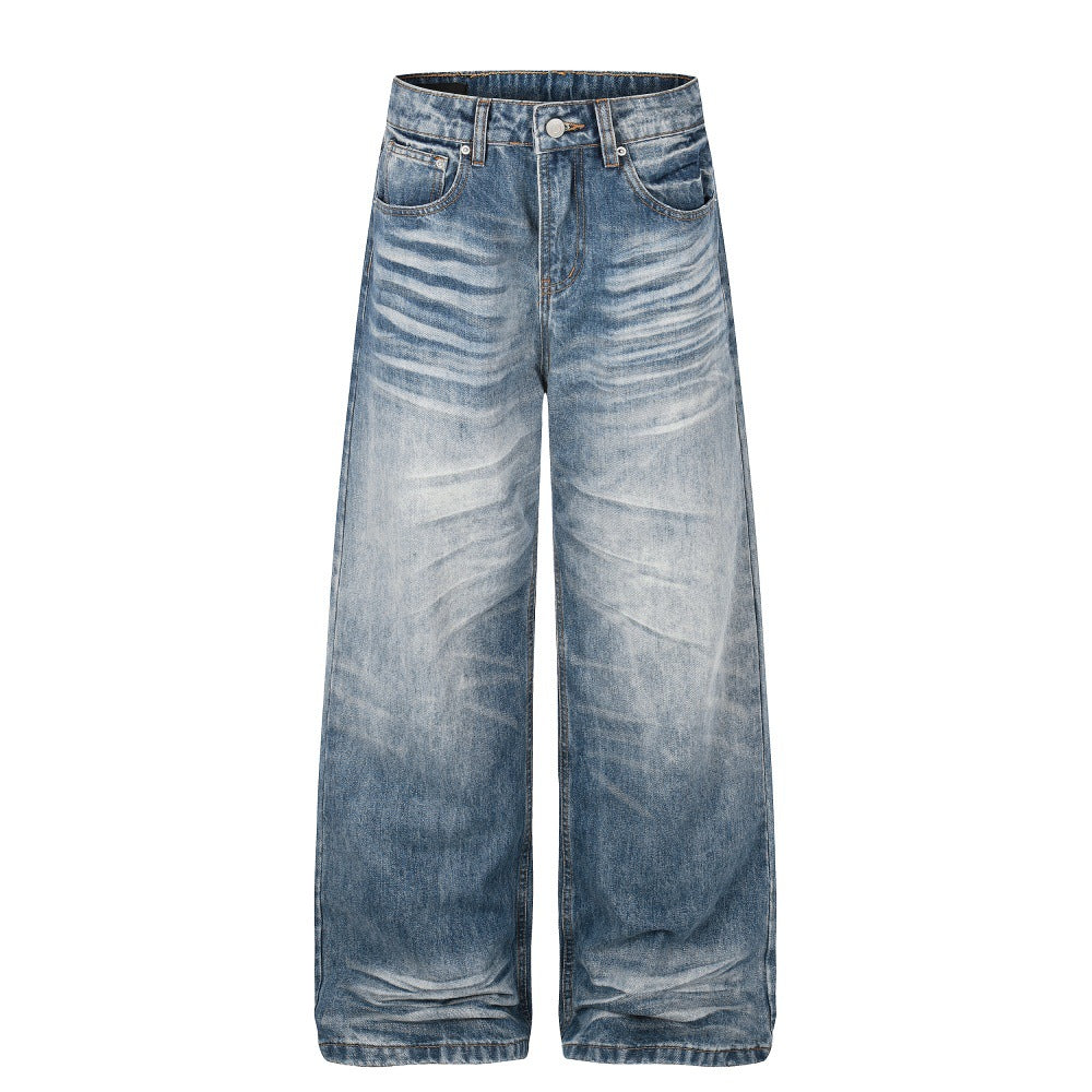 High-rise, wide-leg denim jeans in a medium-blue wash with a light faded gradient, featuring a button-fly closure.