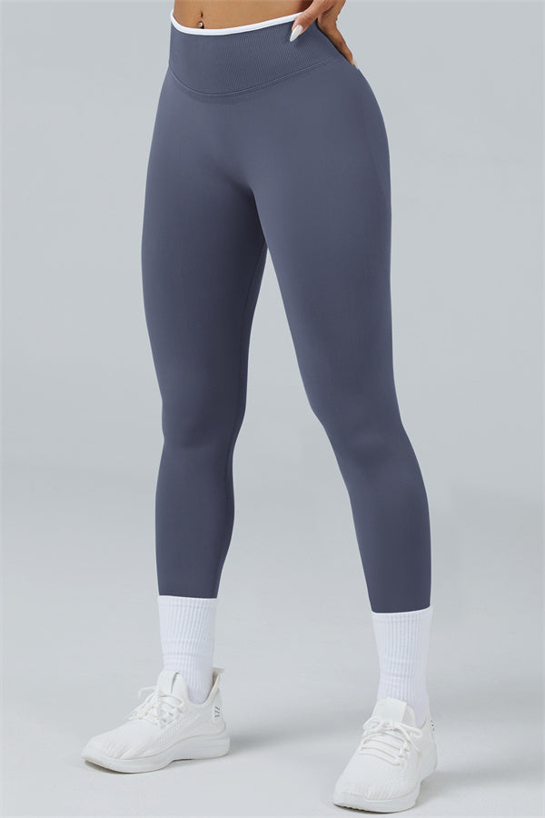 Fitglutes Activewear long sleeve crop top and leggings 2-piece set, designed for workout and gym sessions, in black with athletic fit.