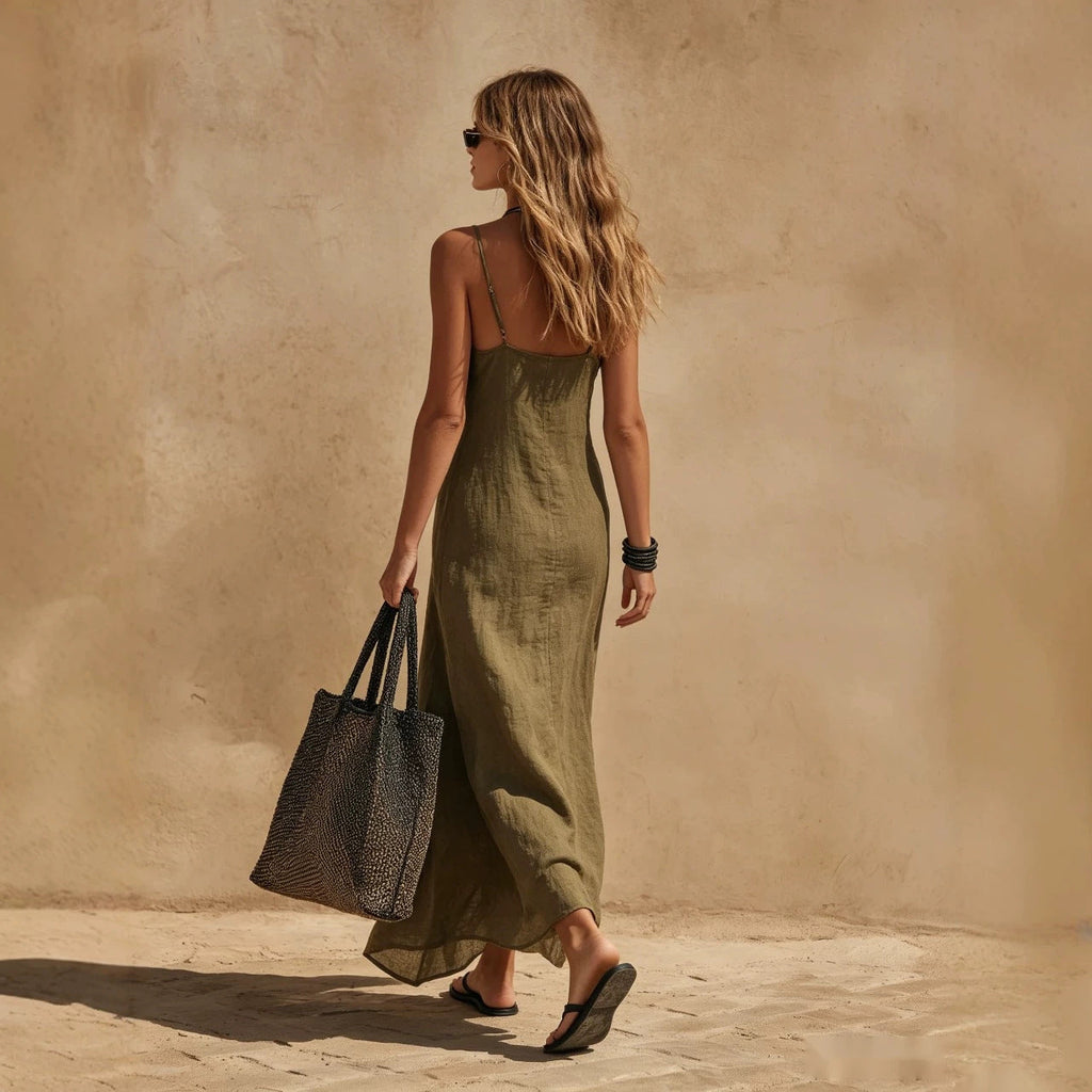 Women's minimalist sleeveless slip dress in loose fit, casual resort style by Plush Fashion Hub, shown in a relaxed, elegant design.