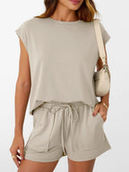 Women's soft round neck cap sleeve lounge set with drawstring shorts by Plush Fashion Hub, featuring a comfortable, casual style.