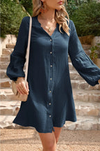 Devine Notched Balloon Sleeve Cotton Mini Dress by Trendsi, featuring a stylish mini length and unique notched balloon sleeves.