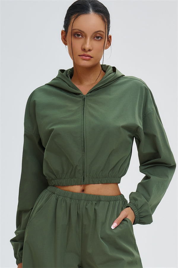 Svelte UV protection crop hoodie by Plush Fashion Hub featuring a fitted design and lightweight fabric in a stylish casual look.