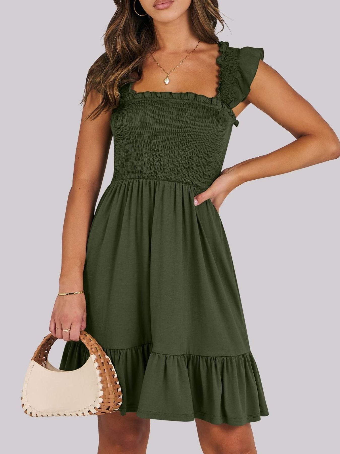 Women's smocked ruffle hem mini dress by Trendsi, casual lightweight summer dress with a flowy design and feminine ruffle details.