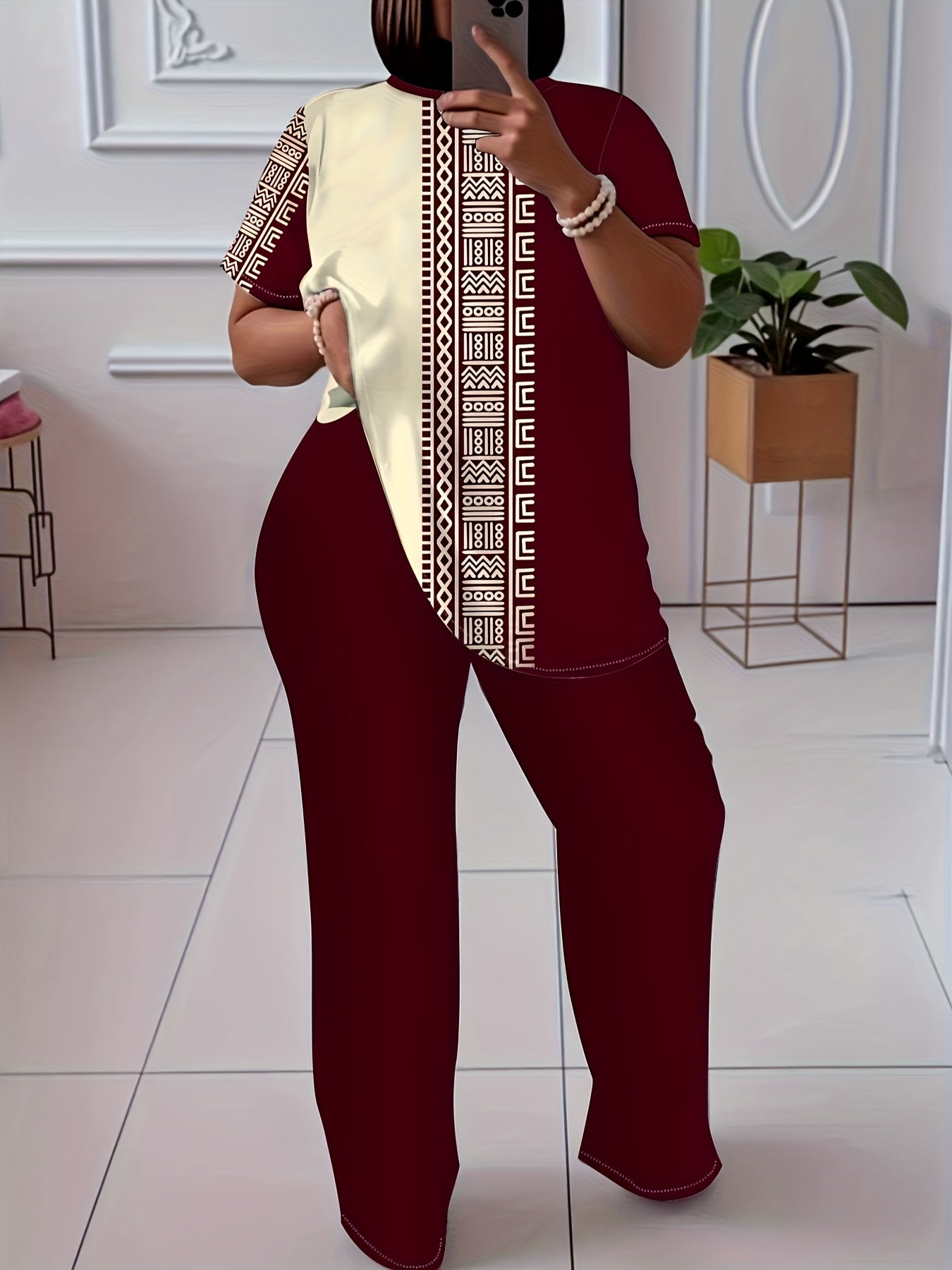 Plus size ethnic print casual two-piece outfit for women, featuring vibrant patterns and comfortable fit by Plush Fashion Hub.