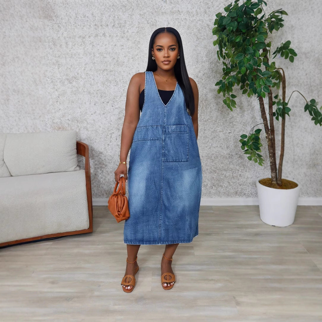 Washed pocket sleeveless denim dress by eprolo, mid-length style with front pockets and casual fit, displayed on a hanger.