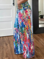 Painted wide leg cotton blend pants from Trendsi, breathable relaxed fit trousers with colorful abstract patterns.