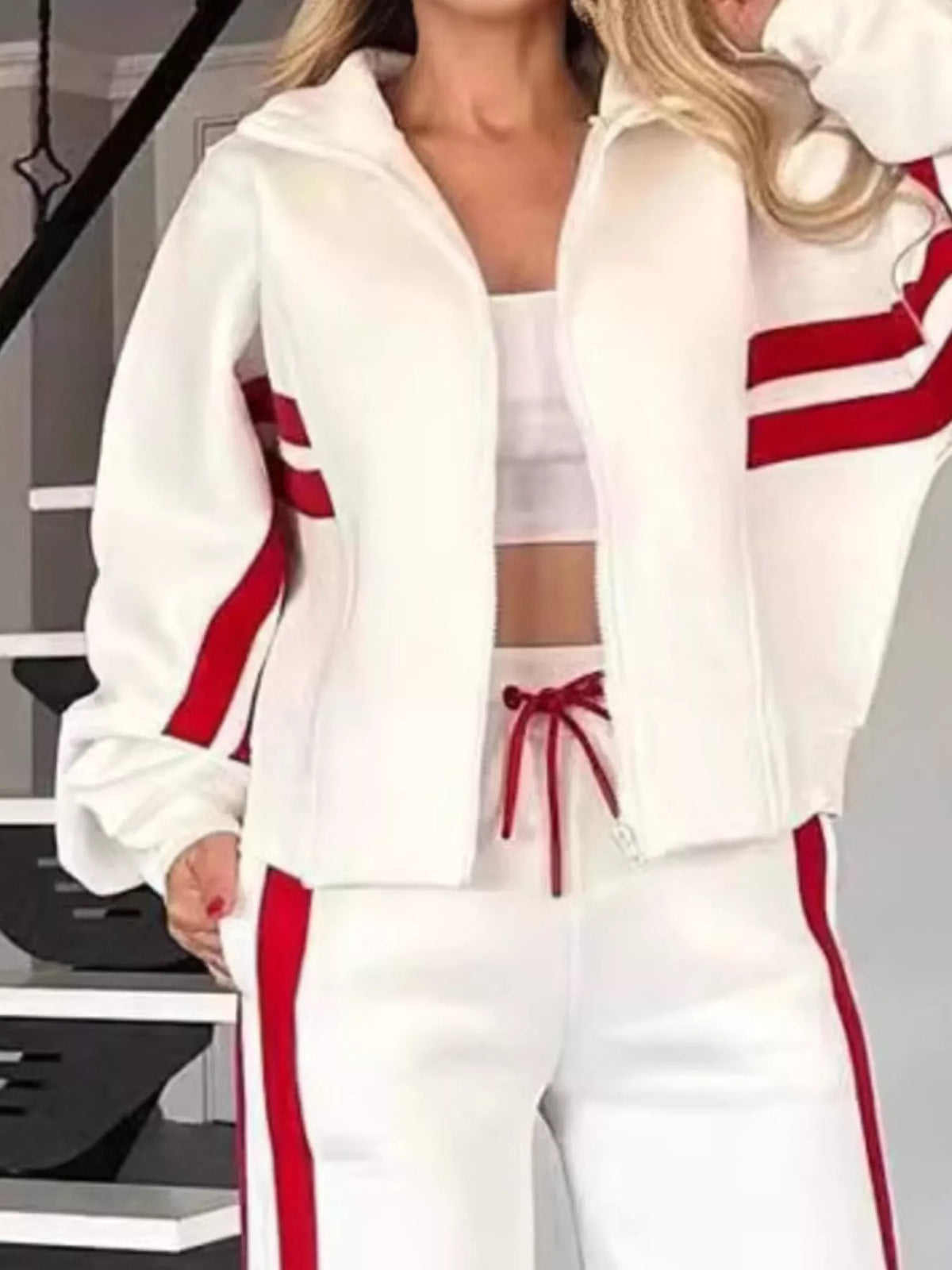 Plus size contrast stripe zip-up activewear jacket and pants set by Plush Fashion Hub, shown on a model.