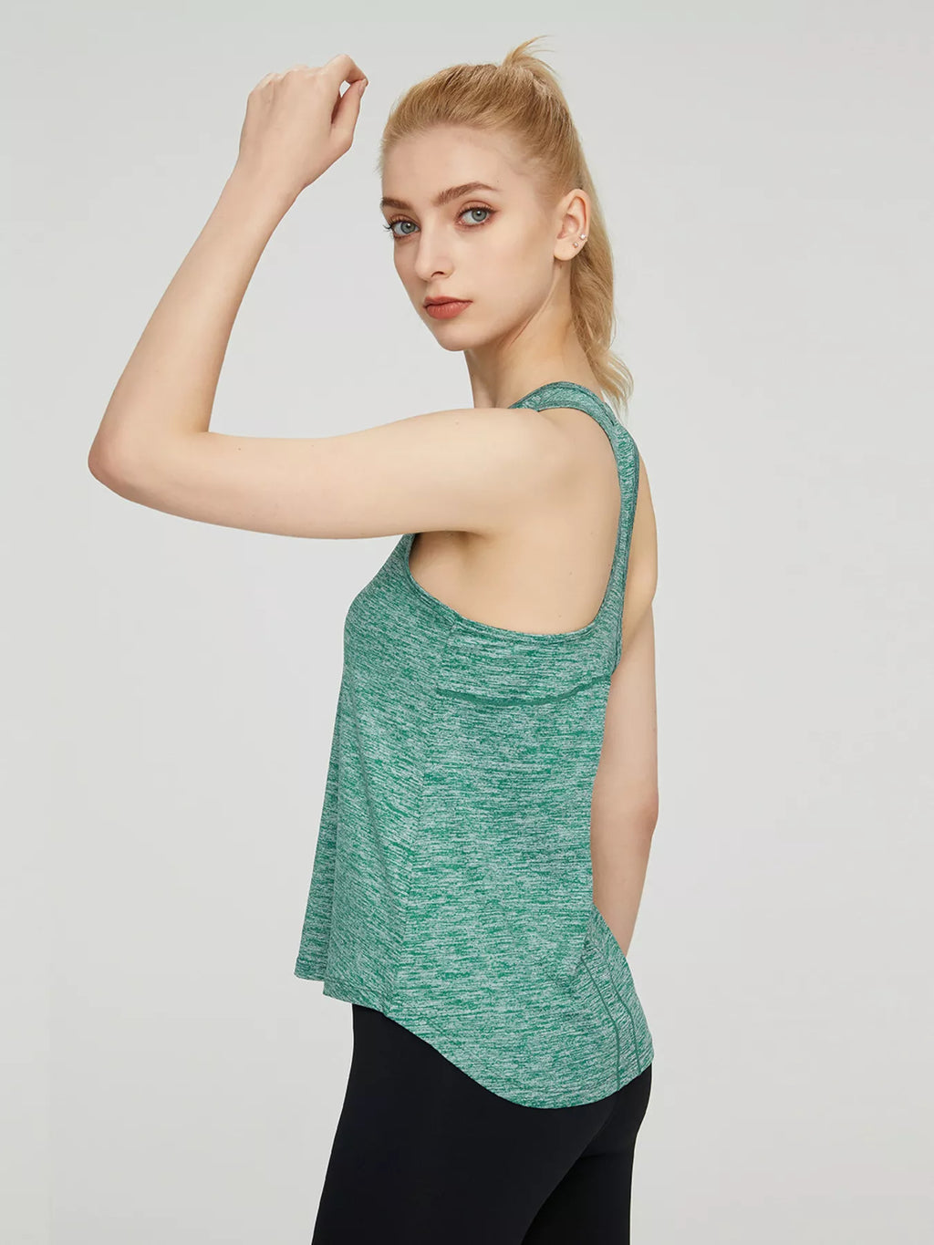 Shopimist breathable quick-drying active tank top shown on a model, designed for workout and athletic activities.
