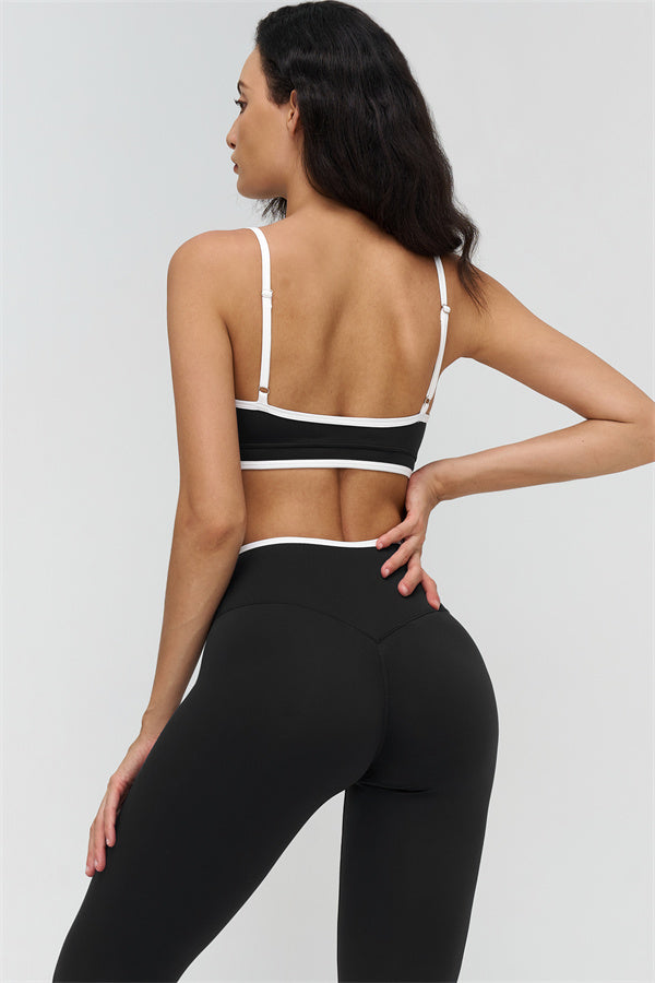Fitglutes activewear Crave contrast sports bra and leggings 2-piece set featuring stylish black and white workout gear for fitness and gym.