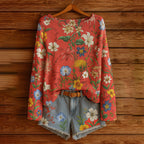 Women’s fall wildflower print long sleeve T-shirt from Plush Fashion Hub, featuring vibrant floral design and casual fit.