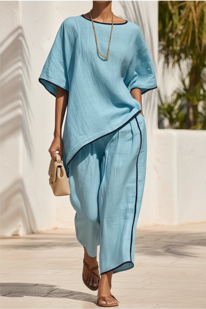Women's casual resort loose short-sleeve top and pants set by Plush Fashion Hub, featuring comfortable relaxed-fit fabric in a stylish design.