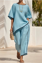 Women's casual resort loose short-sleeve top and pants set by Plush Fashion Hub, featuring comfortable relaxed-fit fabric in a stylish design.
