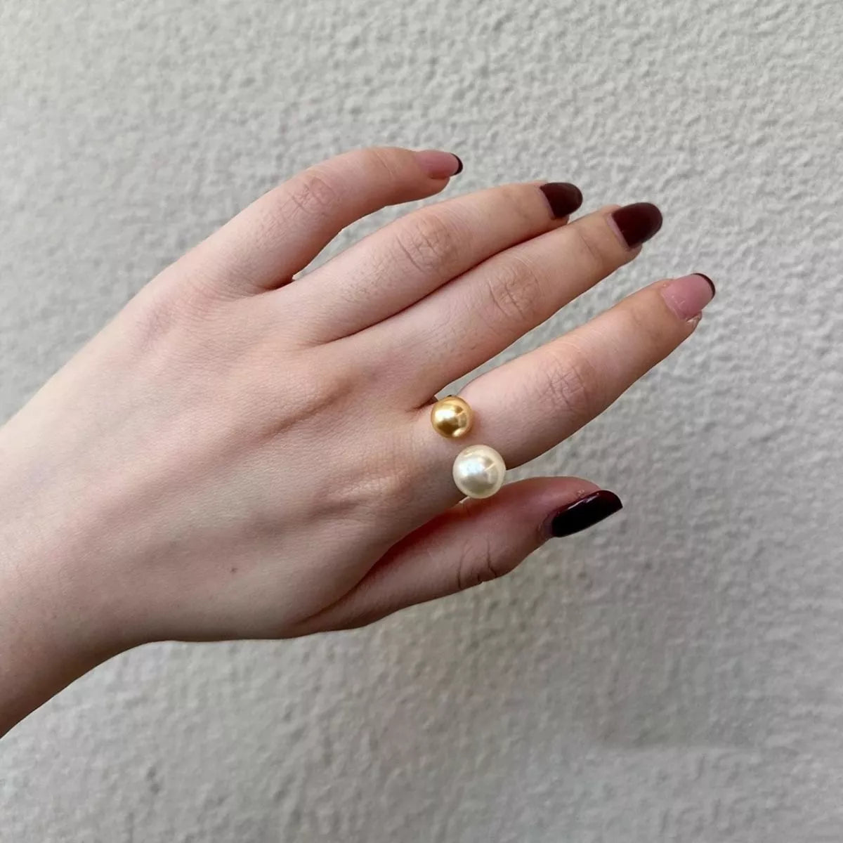 Elegant double pearl open ring by Shopimist featuring two lustrous pearls on a sleek silver band.