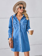 VYSN pocketed dropped shoulder mini denim dress displayed on a hanger, showcasing its casual style and classic blue denim fabric.