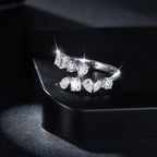 Sterling silver bypass ring with 2.6 carat moissanite gemstone, elegant jewelry design by Shopimist