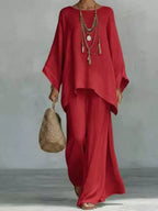Plus size full size round neck top and wide leg pants set by Trendsi, casual stylish pant set, front view.