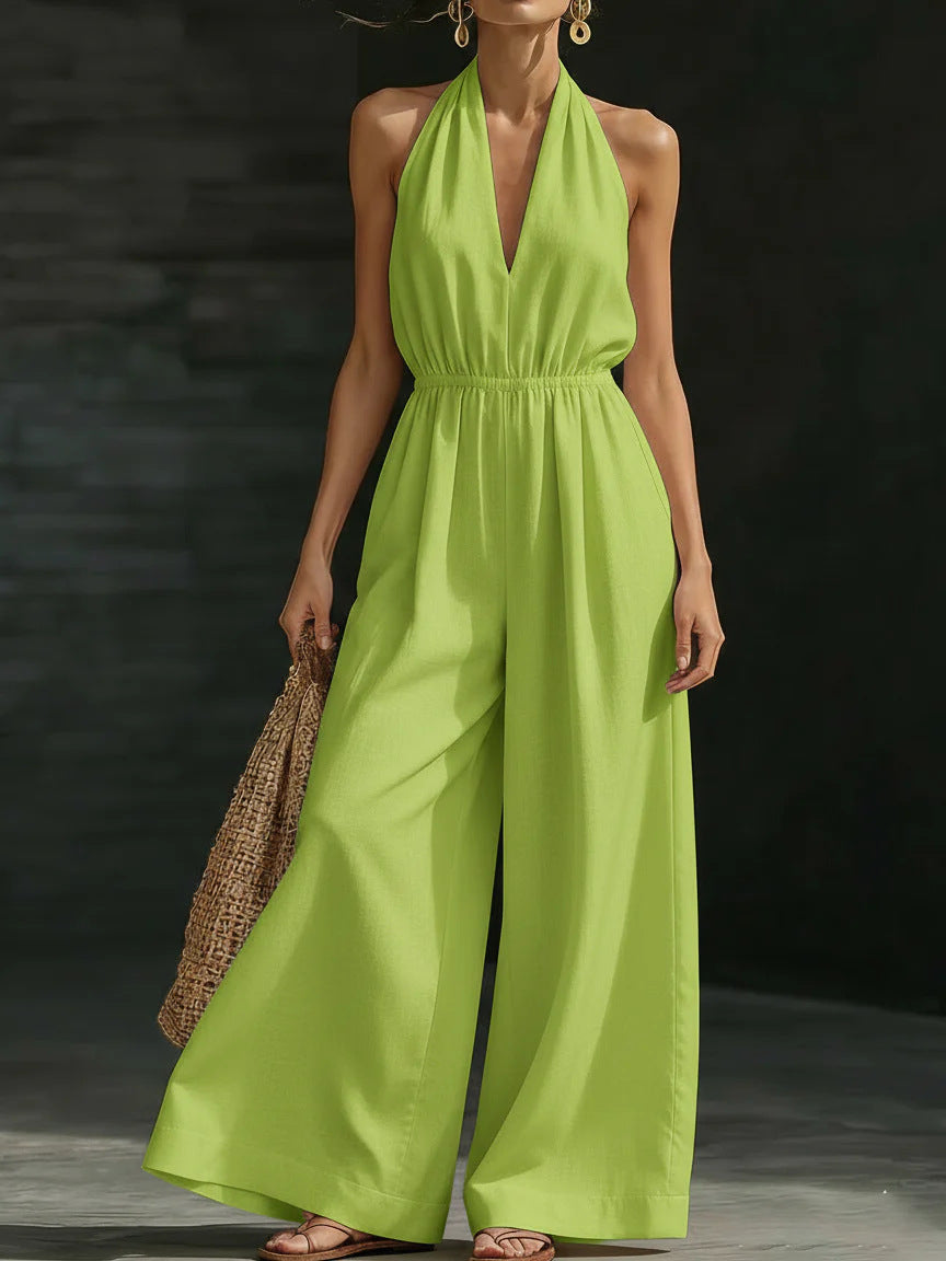 Plush Fashion Hub women's V-neck halter neck jumpsuit with sleeveless design, fitted waist, and wide-leg pants.