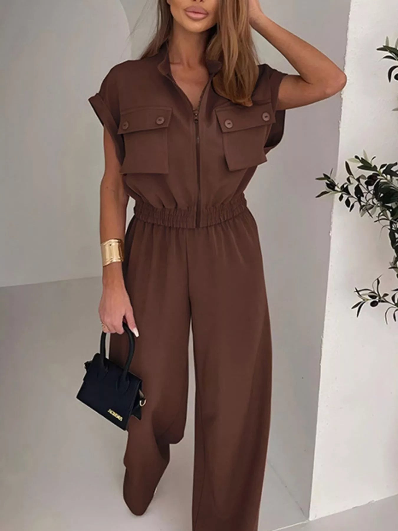 Plush Fashion Hub cargo pocket zipper front jumpsuit with long sleeves and functional front pockets, stylish and casual wear.