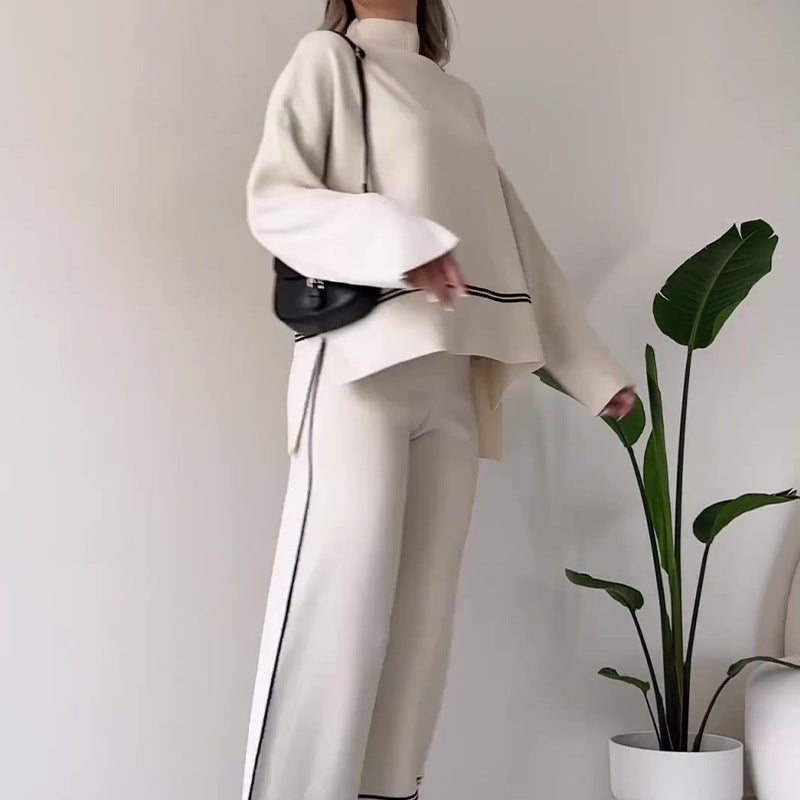 Women’s solid color casual two-piece set by FitiqueFit with loose top and bootcut pants, perfect for everyday comfortable wear.