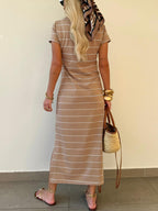 Women's striped short sleeve maxi T-shirt dress with side slit by Plush Fashion Hub, featuring a relaxed fit and casual style.