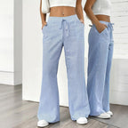 Women's striped print wide-leg casual pants with pockets from FitiqueFit, featuring a straight fit and comfortable long style.