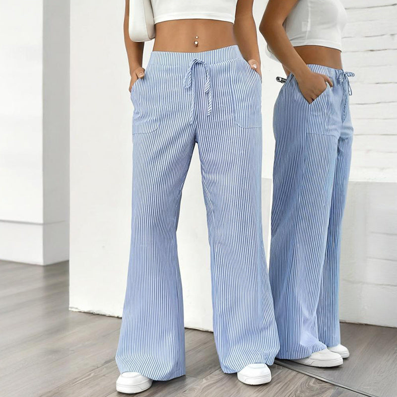 Women's striped print wide-leg casual pants with pockets from FitiqueFit, featuring a straight fit and comfortable long style.