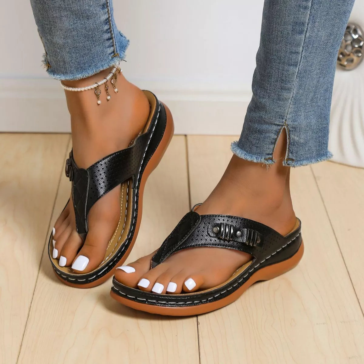 Women's wedge sandals with comfortable toe post design, stylish summer footwear by Trendsi featuring a chic wedge heel.