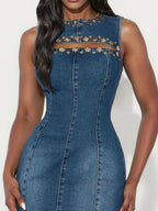 Sleeveless denim dress for women with embellishments and cutout details, trendy fashion from Trendsi.