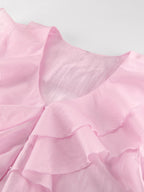 Women's elegant long sleeve blouse with ruffle trim, soft Tencel blend fabric, featuring a stylish and feminine design.