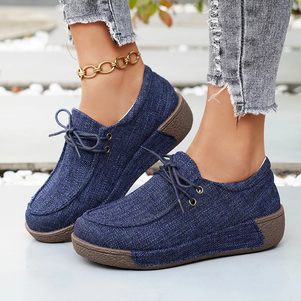Trendsi round toe lace-up sneakers in stylish footwear with a sleek design and comfortable fit, suitable for casual wear.