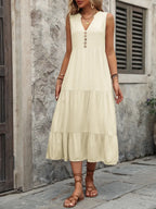 Ivy Lane women's sleeveless button-down dress with notched neck, made of 100% cotton, shown in a natural pose.