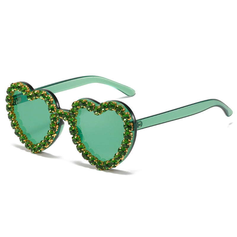Peach heart-shaped rhinestone sunglasses with Y2K style frames, colorful lenses, and decorative rhinestones, fashion eyewear from Plush Fashion Hub.
