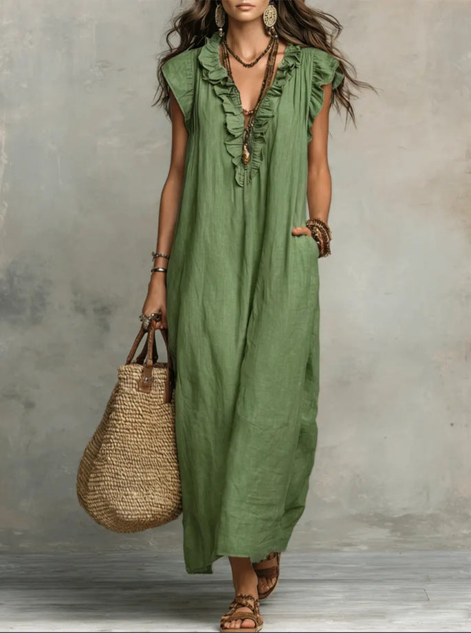 Women's spring and summer elegant dress with ruffles and pockets by Plush Fashion Hub, featuring a flowing design and floral pattern.