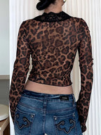 Shopimist lace detail long sleeve top featuring intricate lace accents and a fitted silhouette, ideal for stylish casual or dressy wear.