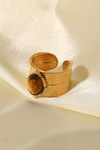 18K gold-plated wide open ring with sleek band design, showcasing a modern jewelry piece from Shopimist.