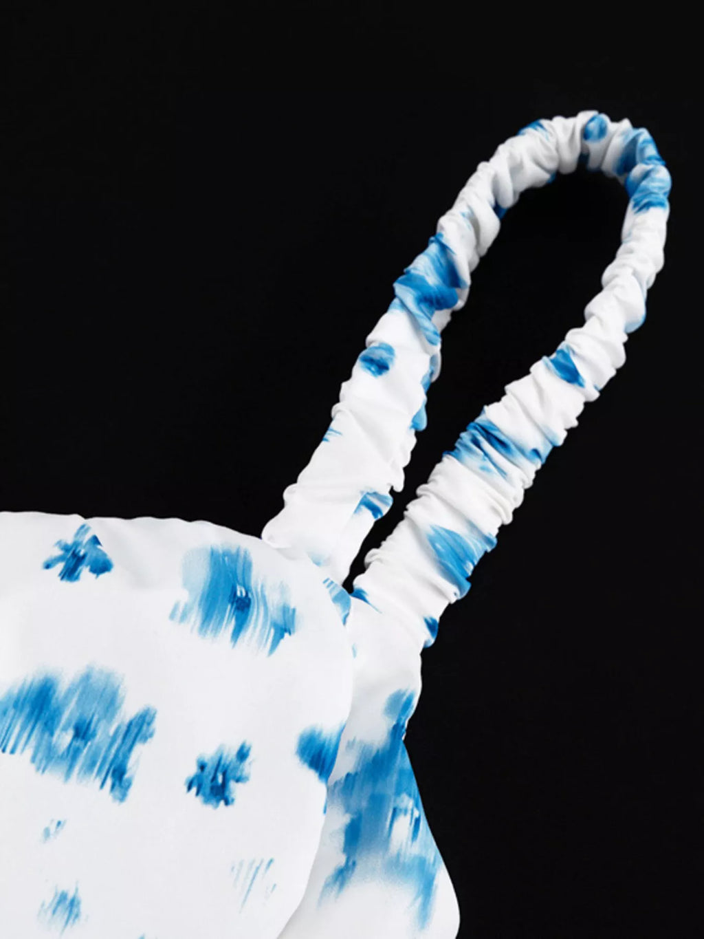 Floral print ruffle hem tank top by Shopimist featuring a lightweight sleeveless design with a flowy ruffle hem.